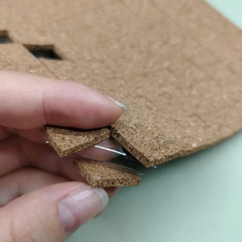 وسادات شحن من الفلين مقاس 1/8 بوصة × 3/4 بوصة × 3/4 بوصة مع دعامة لاصقة